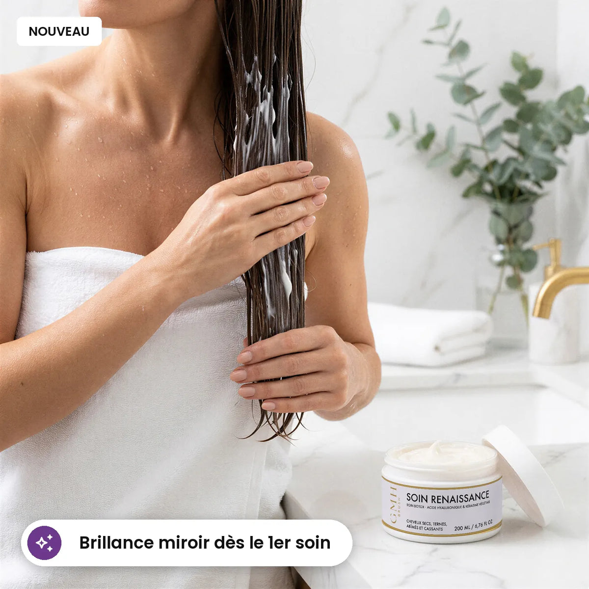 Application du Soin Renaissance GMH sur longueurs mouillées, pot de 200 ml ouvert sur le plan de la salle de bain